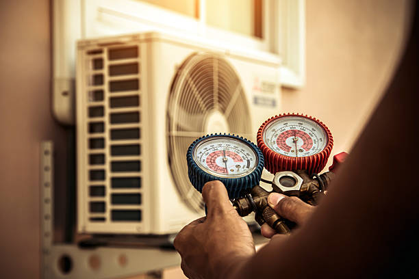 Professional Heat Pump Repair technician working in Keene, OH